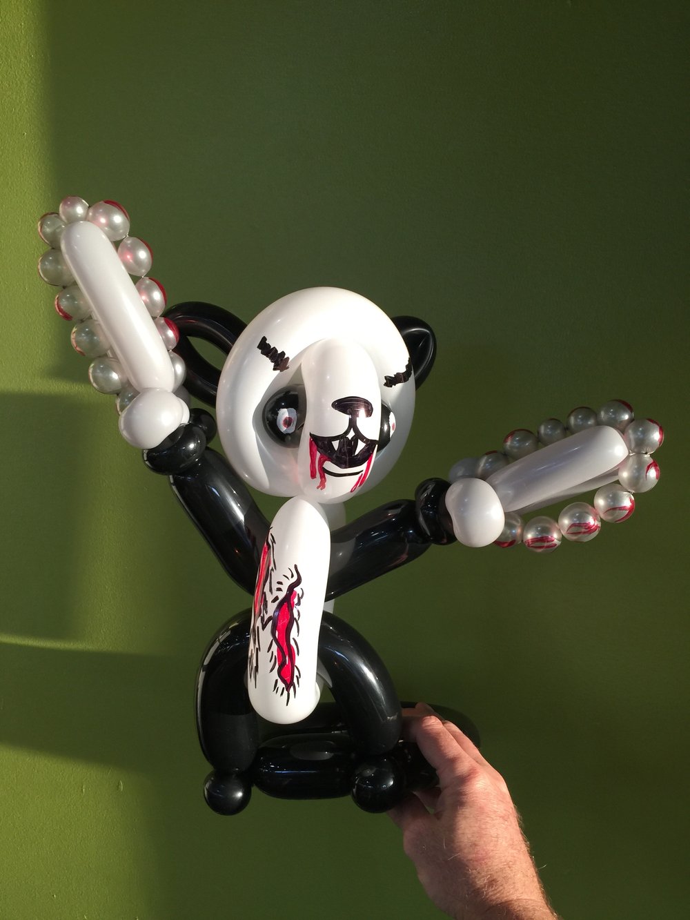 panda with chainsaw arms.JPG