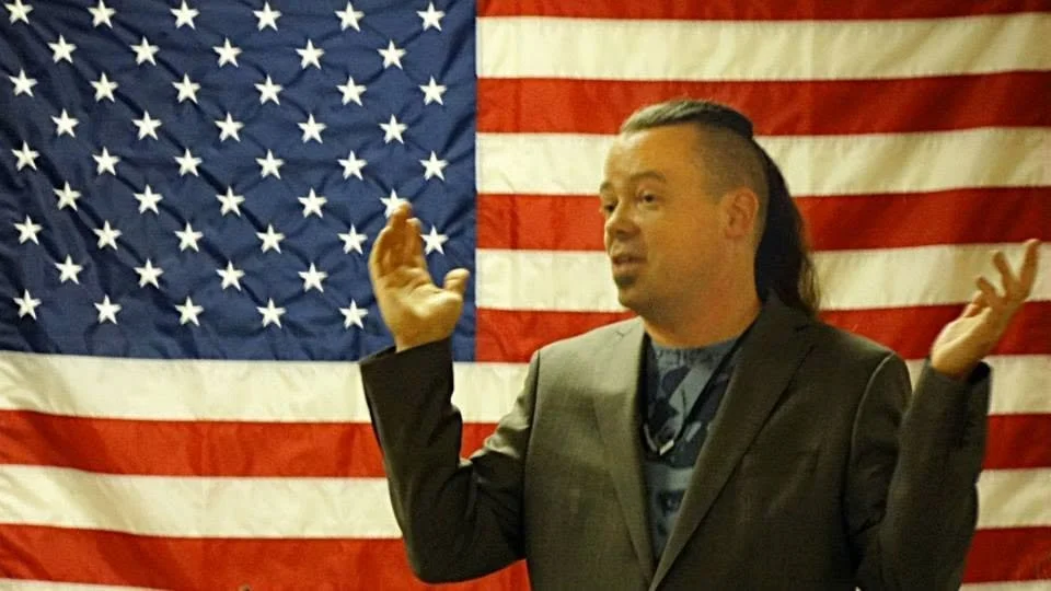 in front of flag.jpg