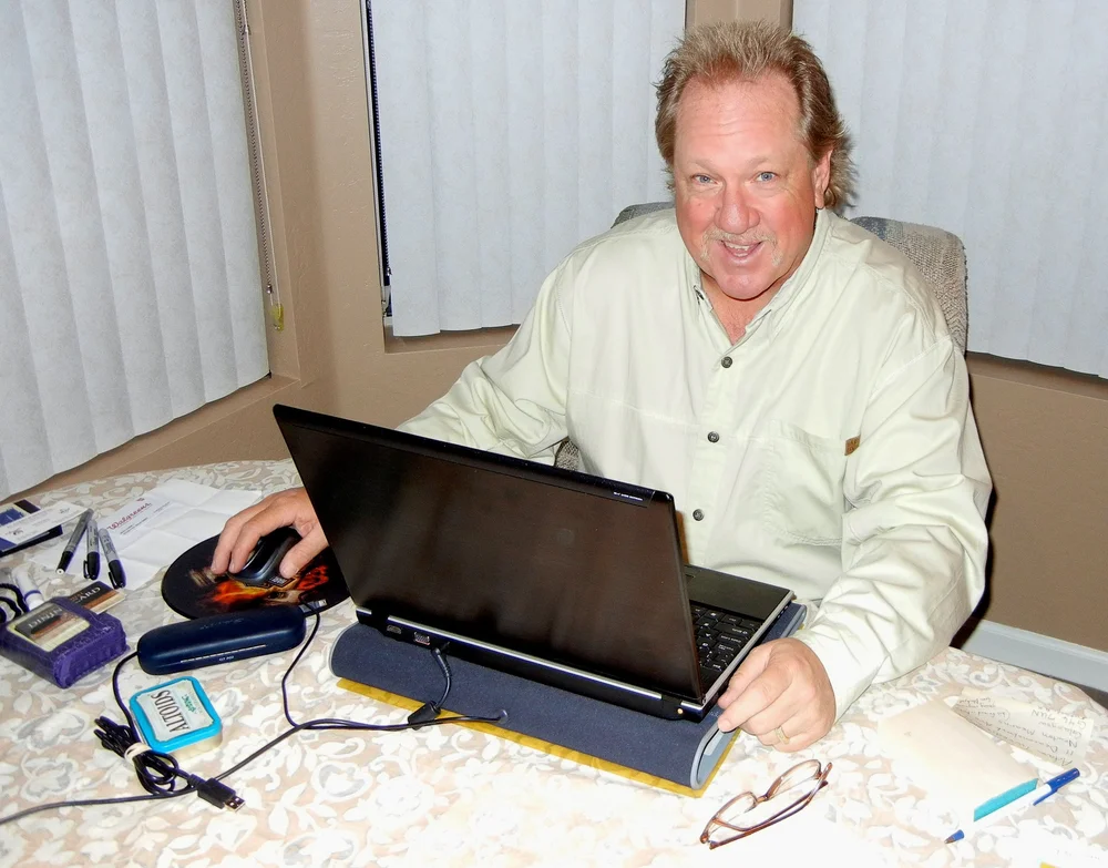 behind a laptop.jpg