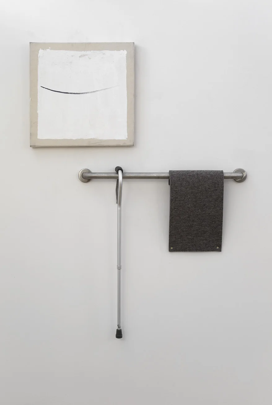 Surrogate , 2013. Oil on canvas, steel railing, aluminum cane, felt, brass screws. Dimensions variable (canvas 24 x 24 in.).