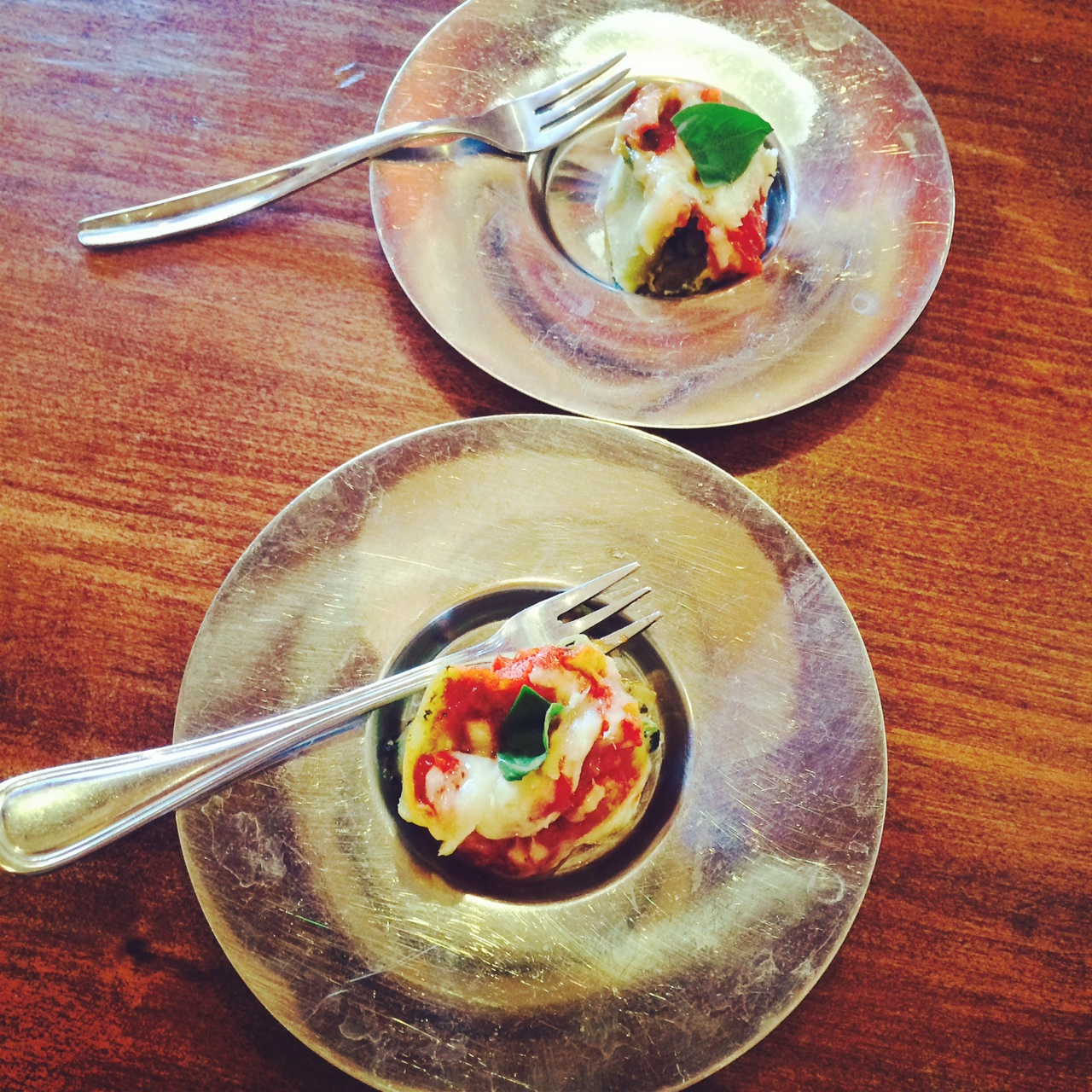Hand-rolled lasagna roll appetizers - artichoke heart
