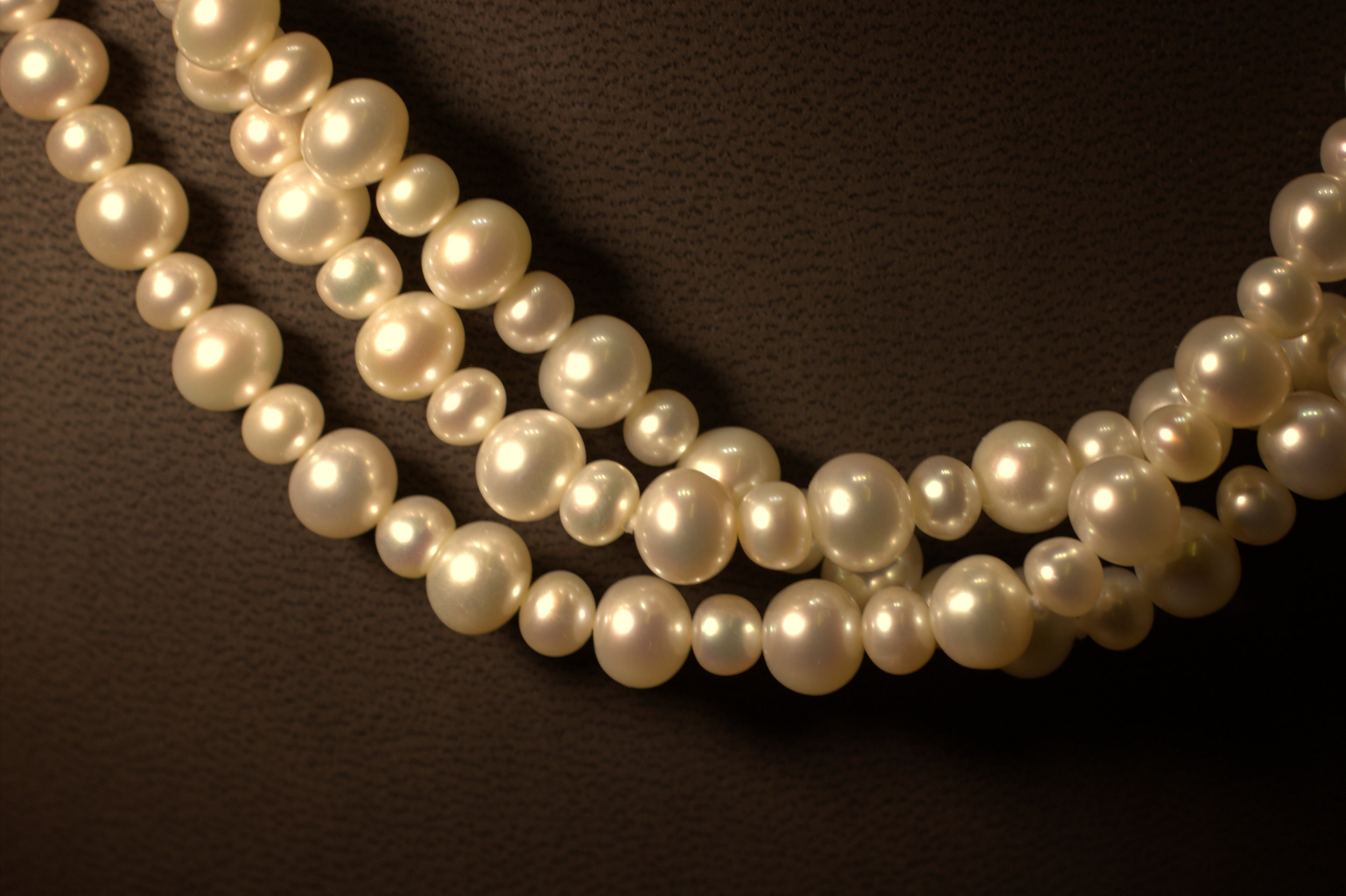 3 row alternating sizes pearl necklace with sterling silver clasp great luster beatiful classic look for a great price lots of bang for your buck available at Marlen Jewelers in Rocky River minutes from Cleveland.jpg