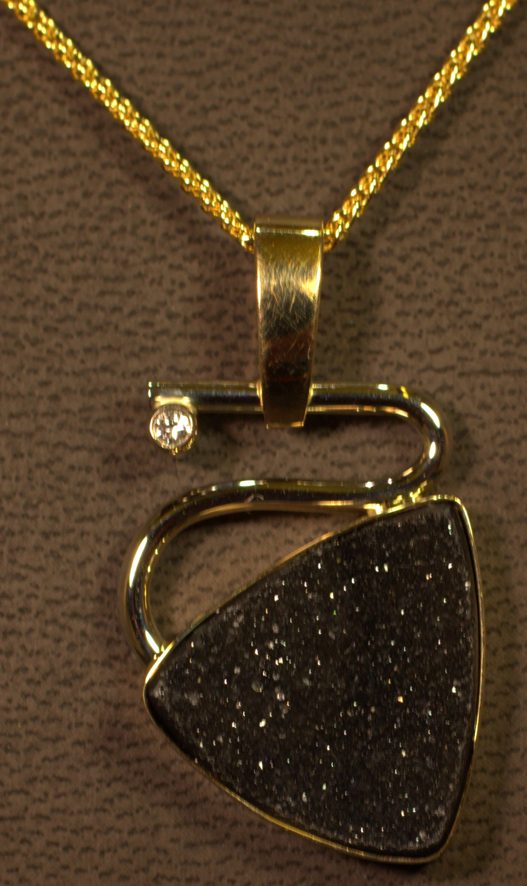 Modern styling contemporary drusy quartz and diamond pendant. 14 karat two tone gold on 14 karat yellow gold chain. $1675