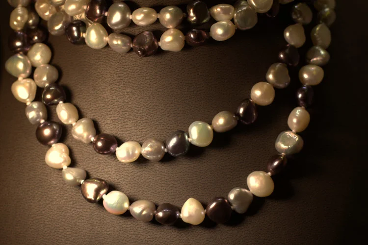 June's birthstone, the pearl, is cultured from living saltwater sea creatures.