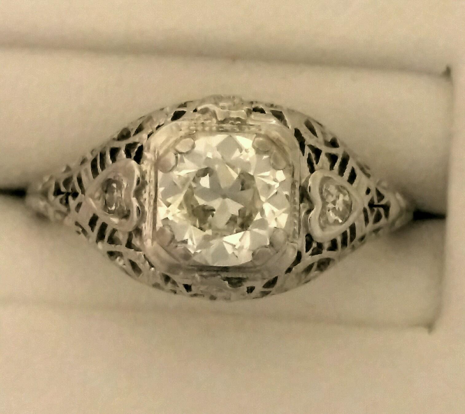 diamond engagement ring fashioned in 18 karat white gold.jpg