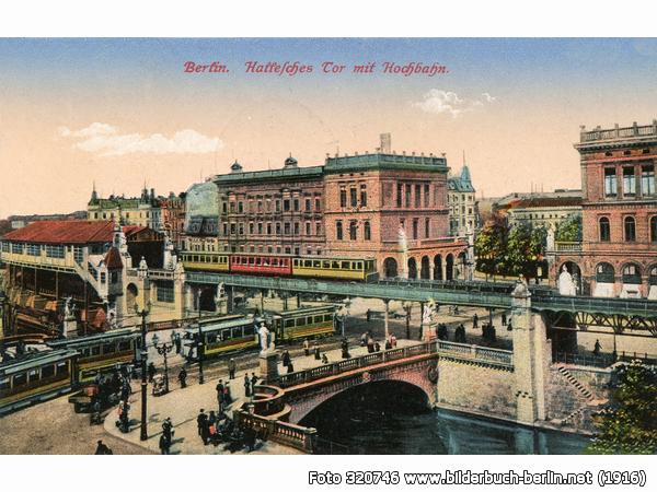 Notice the pink building in the middle of the illustration. In the foreground is the U-Bahn station. Source .