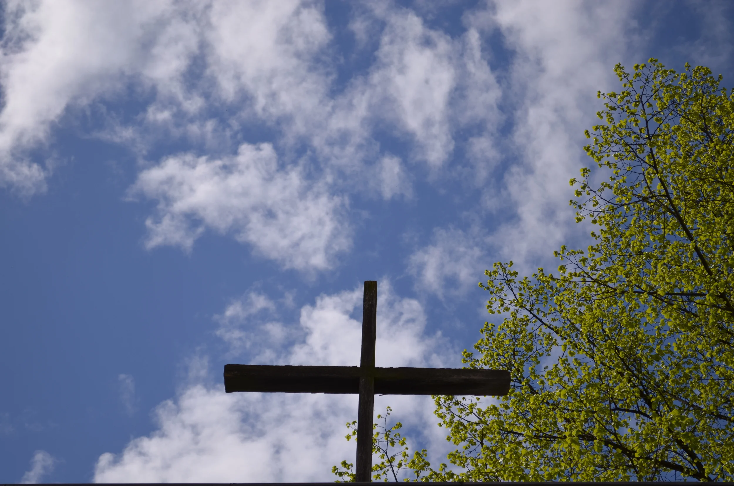 A cross above the entryway.