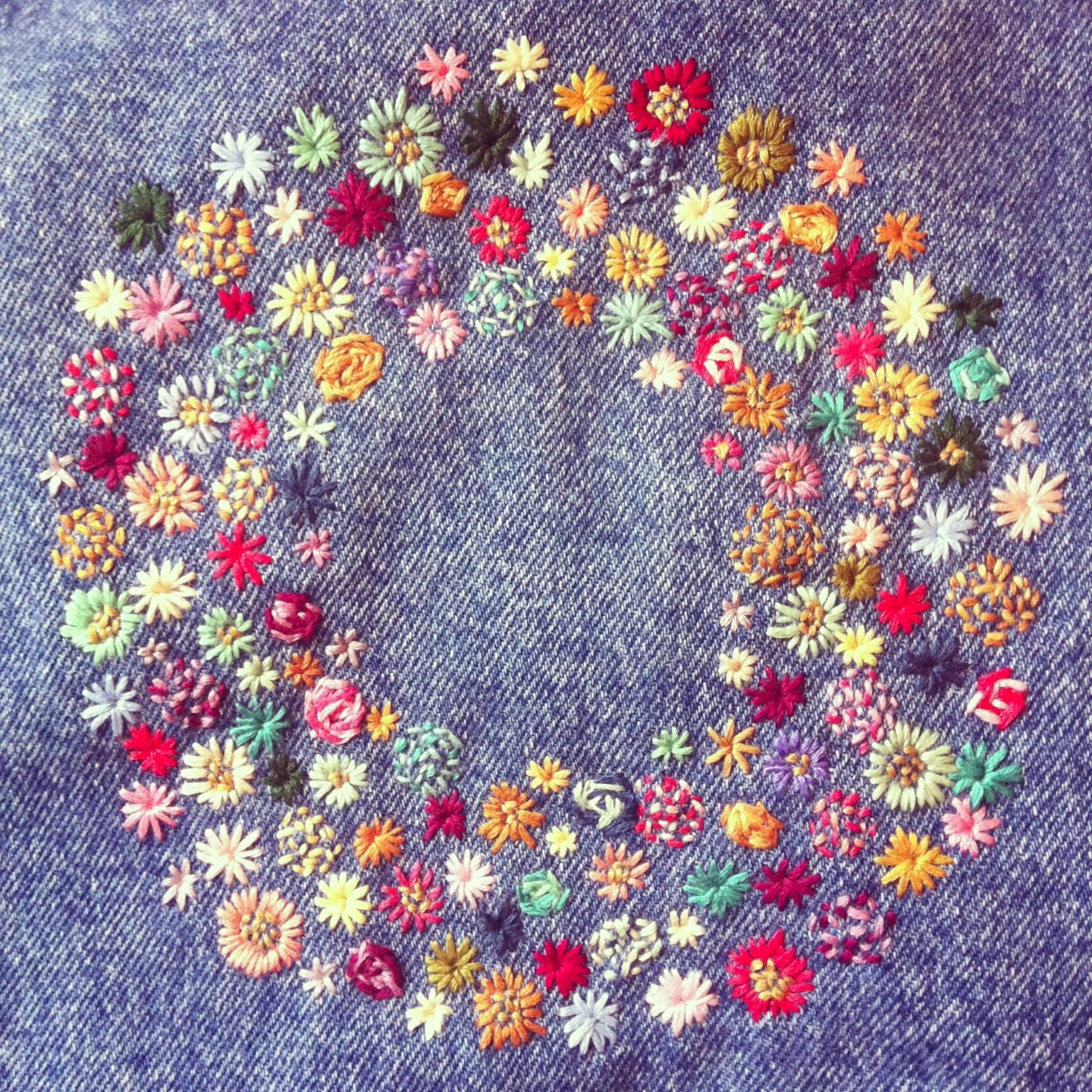 jean jacket detail, March 2013 My winter embroidery project in 2013 was this wreath on the back on my favourite jean jacket. not for sale