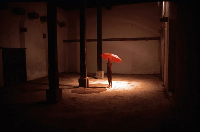waiting again. Painted wood, glass and umbrella. 2003