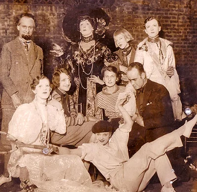Impersonation Party, 1927: Among the revellers are Cecil Beaton (back left), Tallulah Bankhead (front right), Elizabeth Ponsonby (in black hat), and (front row left) Stephen Tennant as Queen Marie of Romania