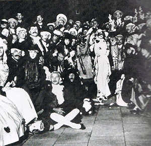 A group photo from a Marchesa Costumed Party. Luisa is in all white center right.