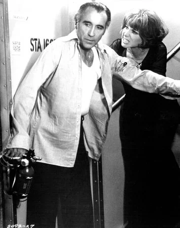 Lee in Airport 1977 with onscreen spouse the silver tongued Lee Grant