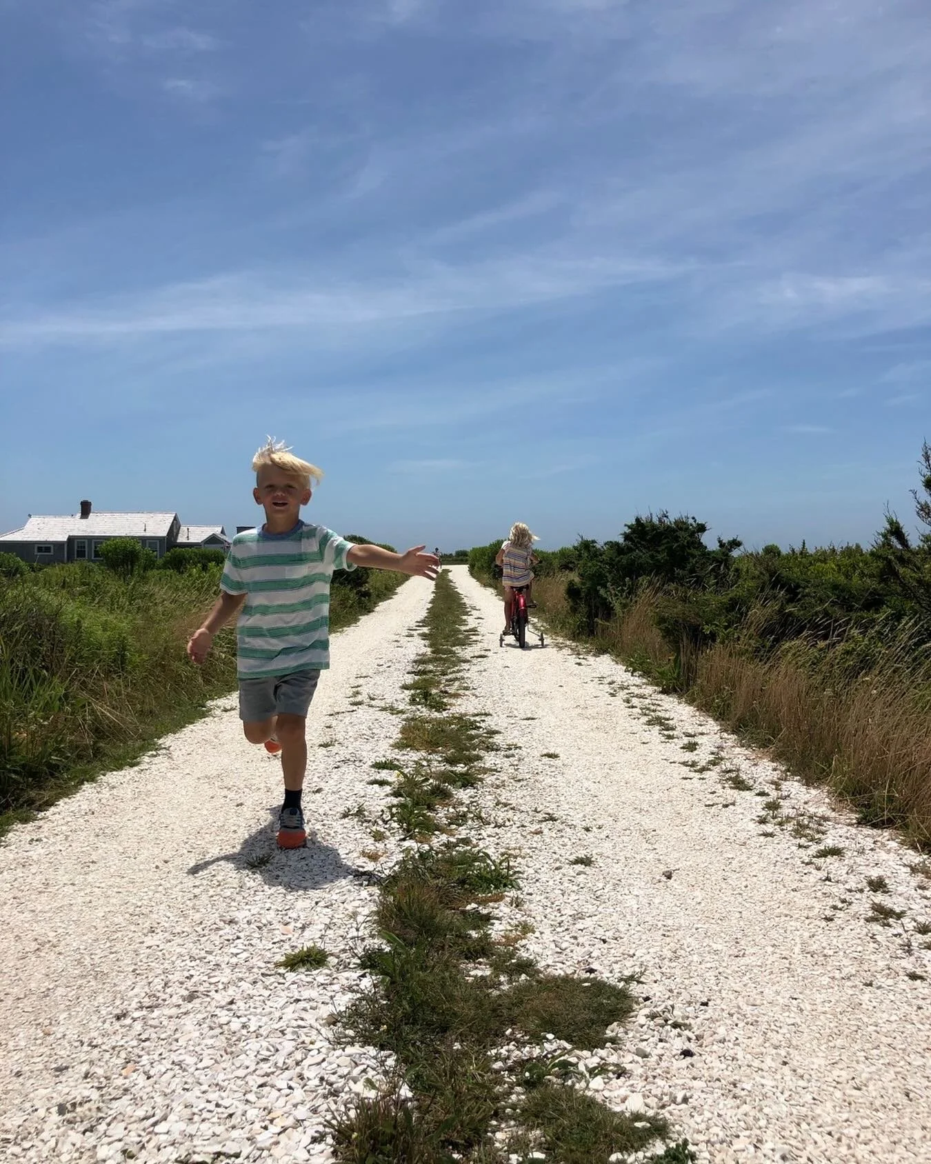 Fun memory on Tuck. 2018. Lochlan and Margot on the driveway.
