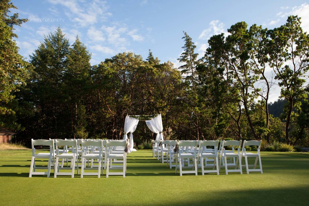 wedding ceremony set up at olympic view golf club | wedding photographer victoria bc