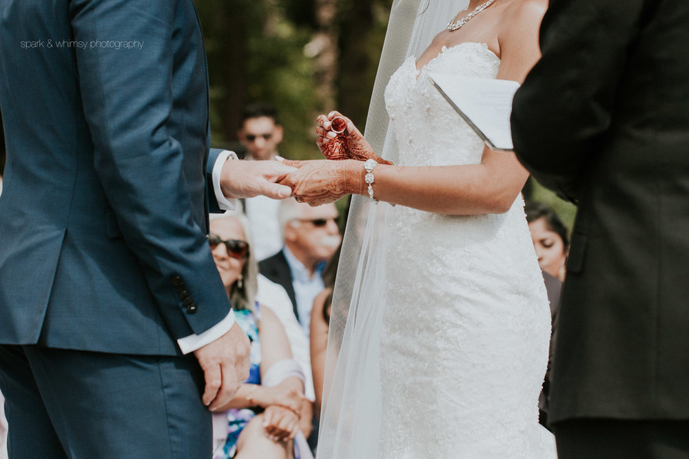 wedding ceremony exchanging rings at Saxe Point | victoria bc wedding photographer