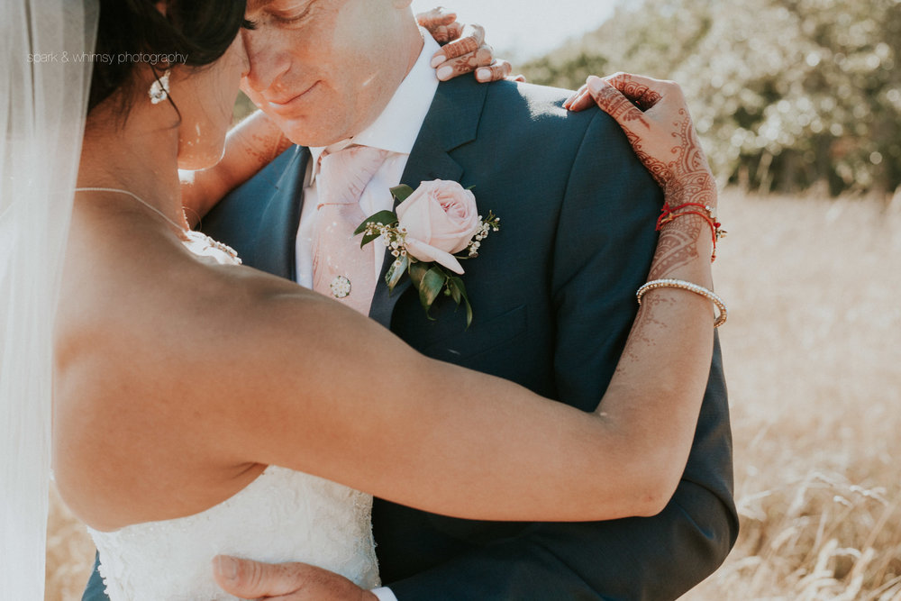 close up of bride and groom embracing | wedding photography victoria bc