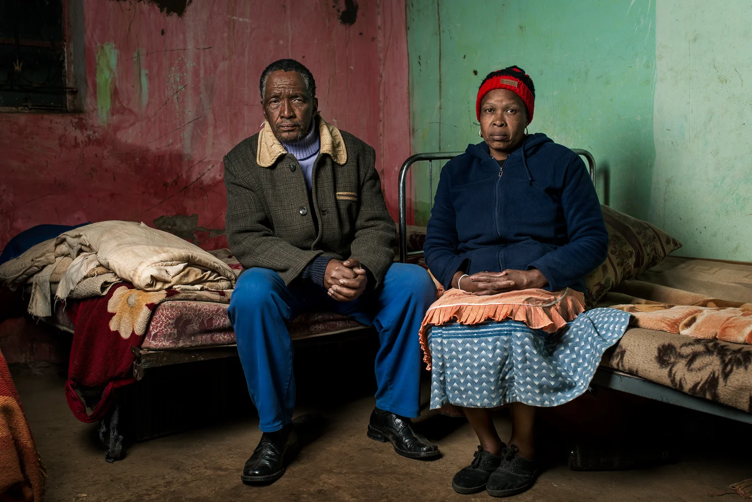 Zamukulungisa Dyanti lives with his wife and 6 children in Lower Seplan in the Cala district of the Eastern Cape. We arrived at his house just as it was getting dark and his son had to move the one light bulb that they owned from room to room in order for us to be able to see what we were doing. He worked as a winch operator at several different mines including Free State Geduld, Western Deep Levels, President Brand and President Steyn. He was diagnosed with silicosis in 1993 and received no compensation for his illness.