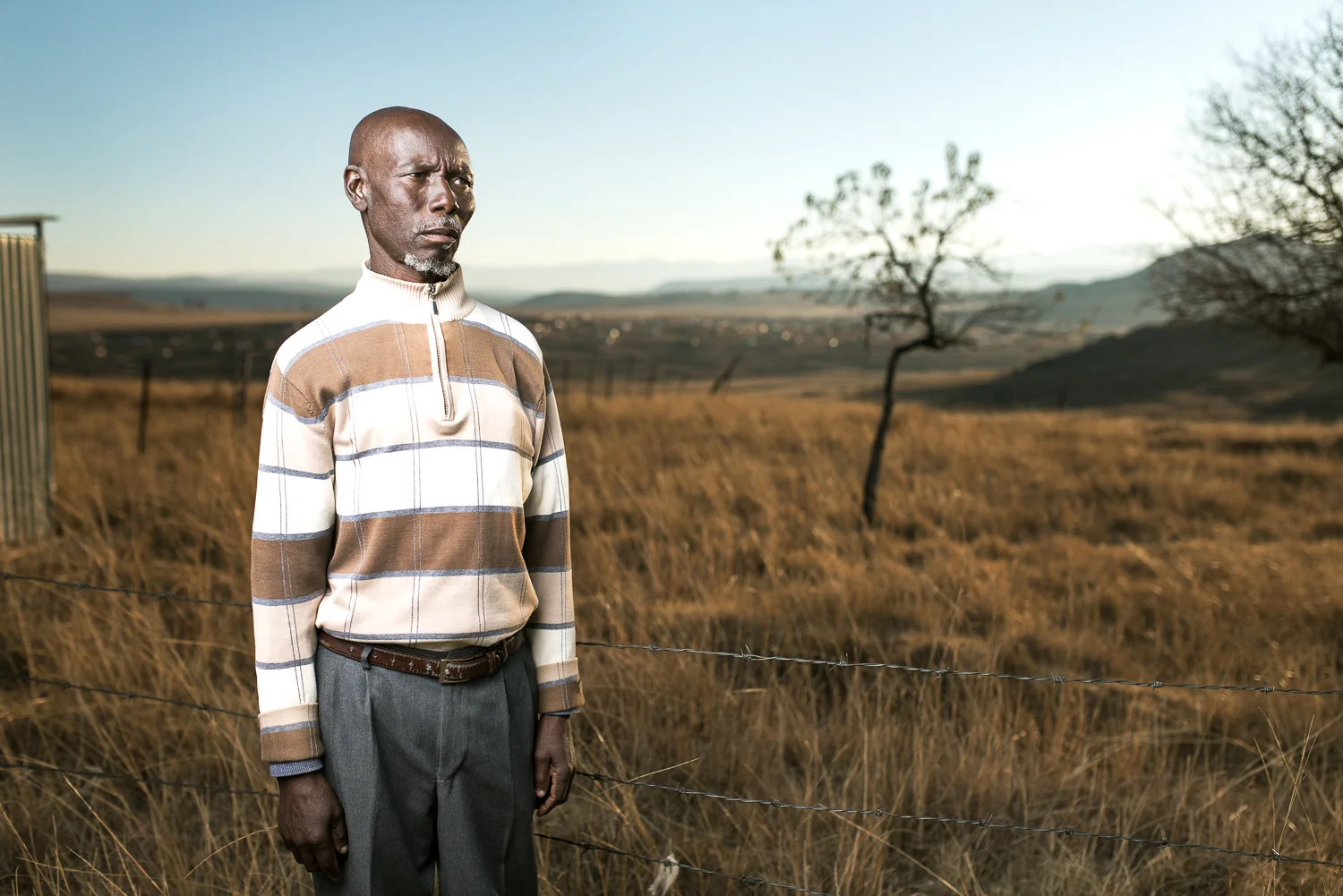 Alloys Msuthu lives in Ramafole, in Matatiele in the Eastern Cape. He is 61 years old and has silicosis from 32 years working underground in the gold mines. He started as a winch driver and became a locomotive driver before becoming a supervisor. As a supervisor he was paid R3 000 a month and from that he would send R1 500 home to his family. In 2009 he was discharged from the mine because of his silicosis. He was admitted to hospital for two years and is now unable to find any employment. “I was liked by my supervisors because I was meeting my targets. My team used to listen to my instructions and respected me. I had pride in my work and dedicated all my energy and time to it. That is why I got silicosis.”