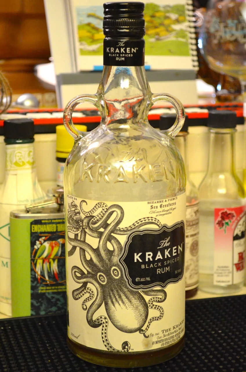 Empty Kraken spiced rum bottle.