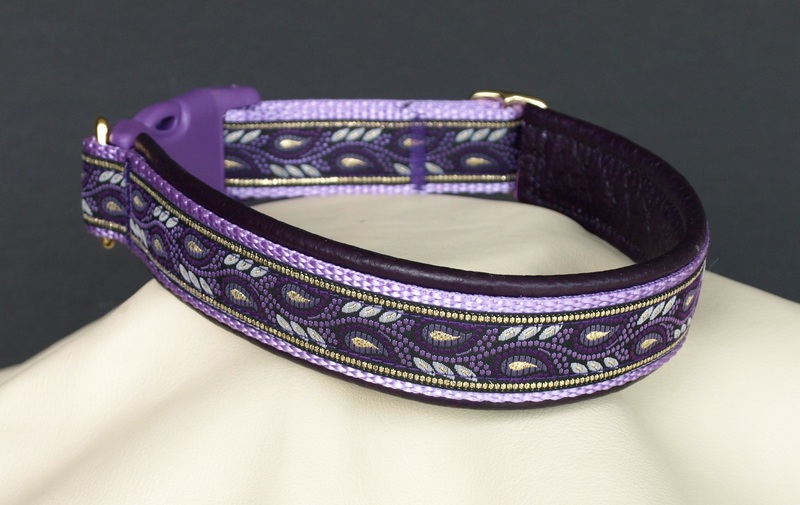 The standard Keeper Flat collar features the same snap buckle as our hidden prong collars but doesn't have the tug. It uses a sliding metal double ring for size adjustment and includes a leash ring.