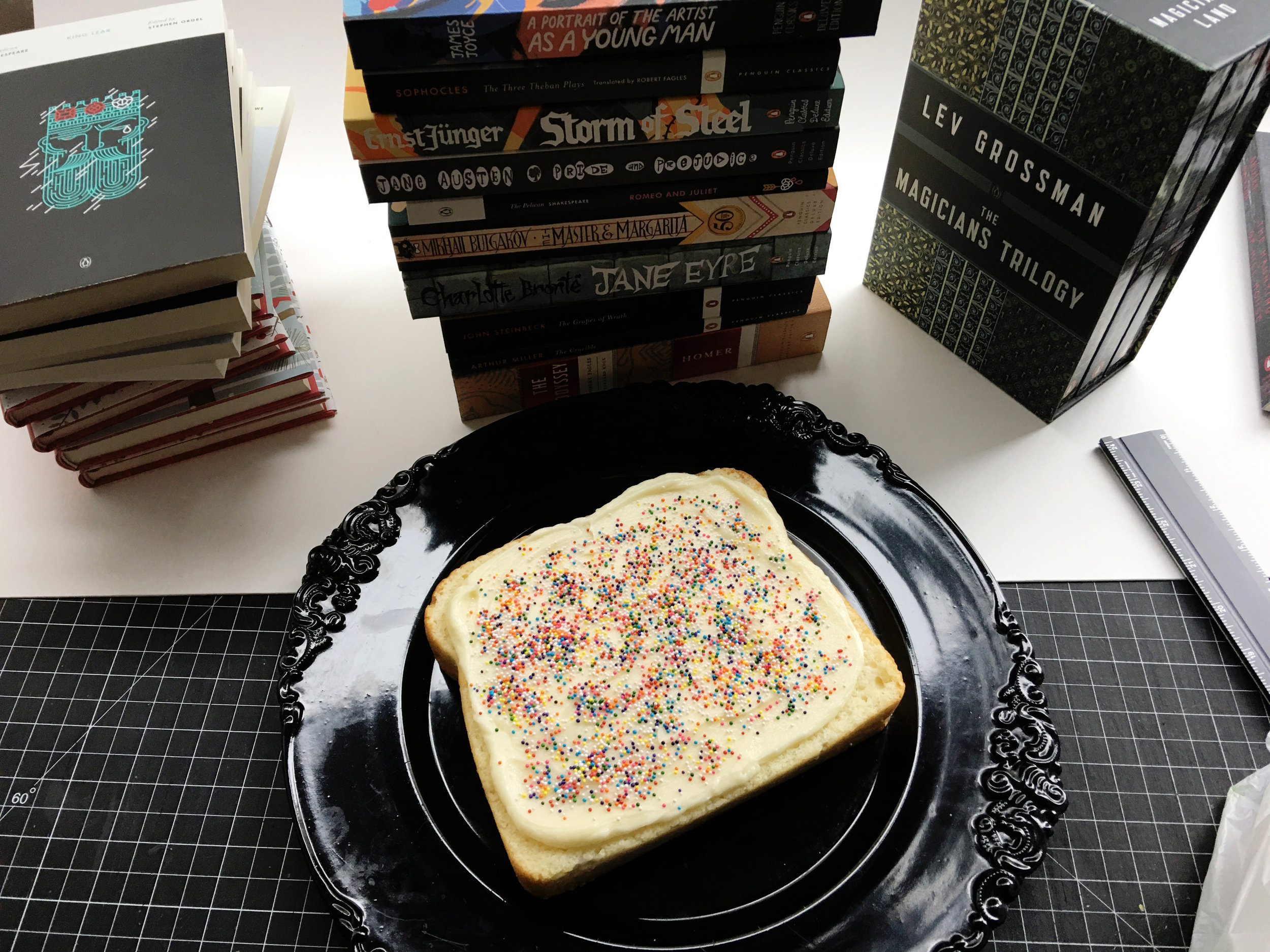 The finished cake is about the size of a trade paperback book (show here to scale on a co-worker's desk).