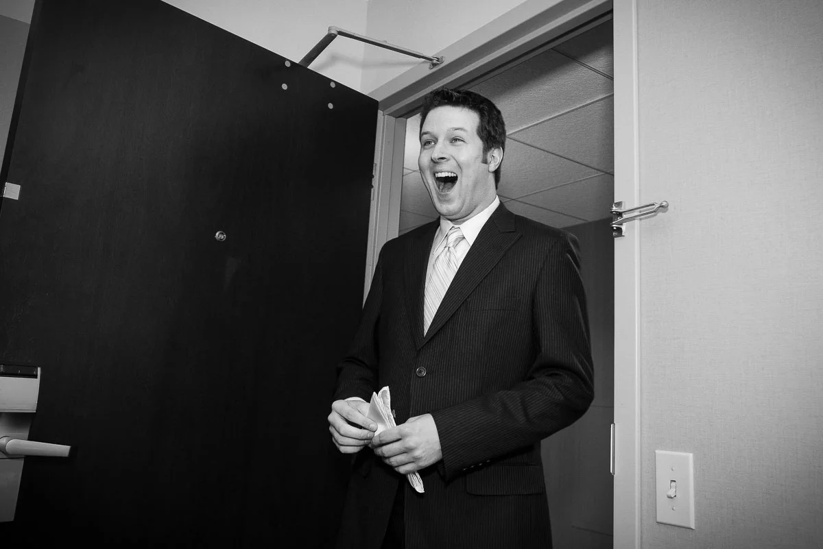 Groom reacts to seeing his bride at the Crown Plaza Chicago. 