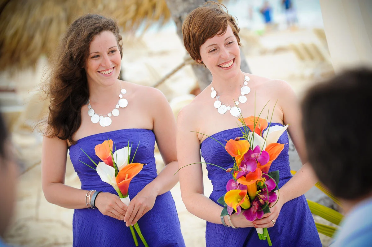 Bridesmaids laugh and smile during a wedding at the Majestic Colonial Resort, Punta Cana. 