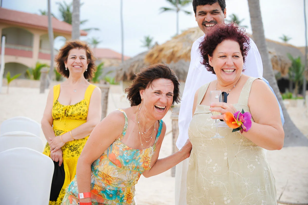 Guests share a laugh after a wedding at the Majestic Colonial Resort, Punta Cana.