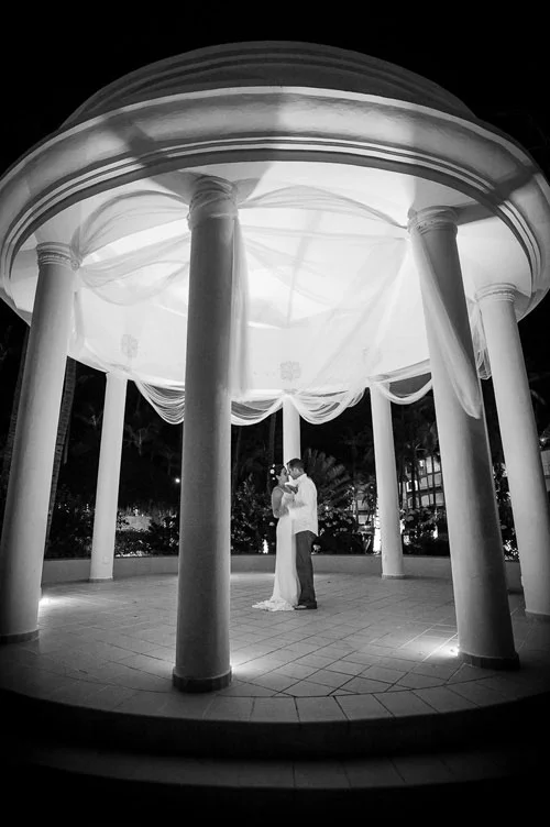 Bridge & groom slow dance under the gazebo at the Majestic Colonial Resort, Punta Cana, Dominican Republic.