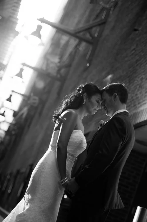 Bride & groom together near the Chicago Theater.