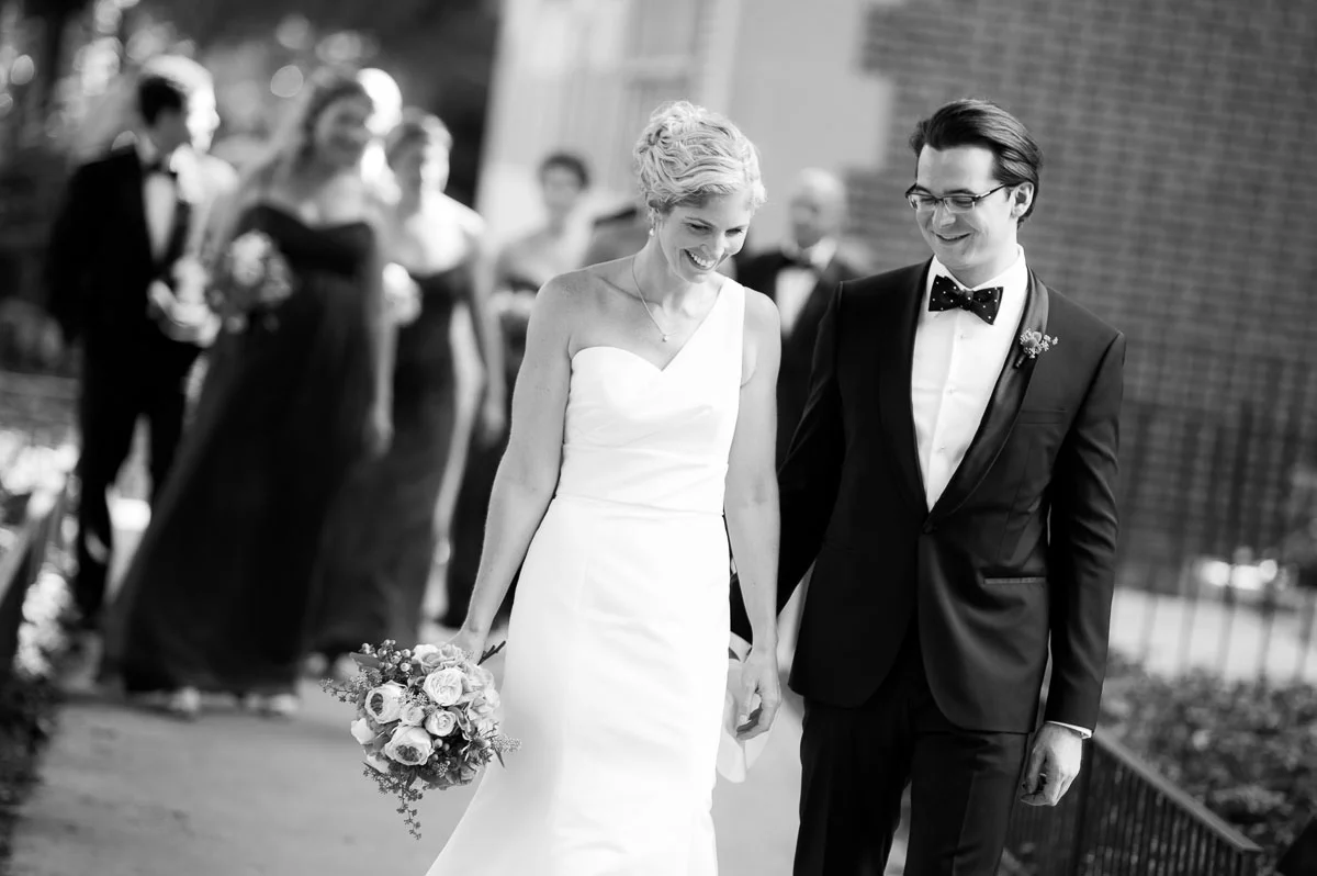 Bridal party walking down Astor Street in Chicago's Gold Coast. 