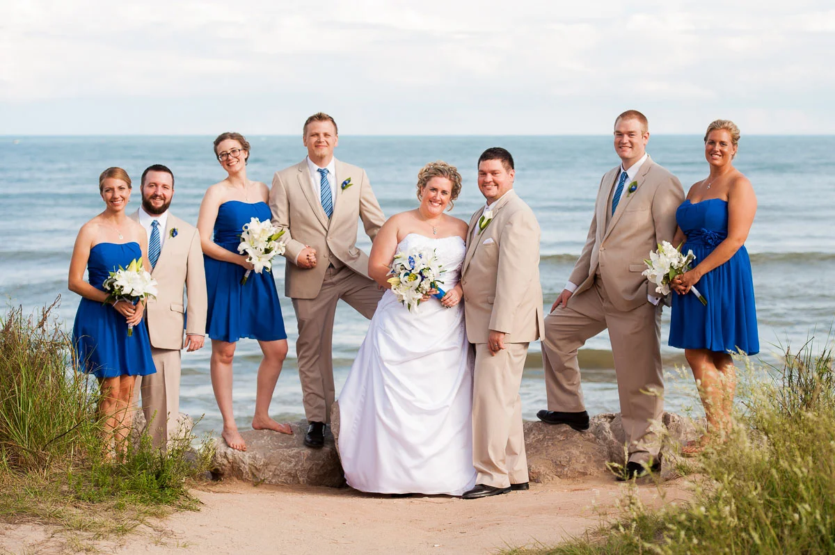 Bridal party on the shores of Lake Michigan at Blue Harbor Resort. 