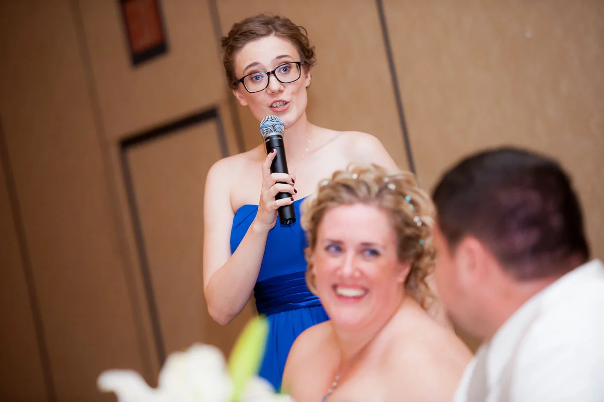Maid-of-honor gives her toast during her sister's wedding at Blue Harbor Resort. 