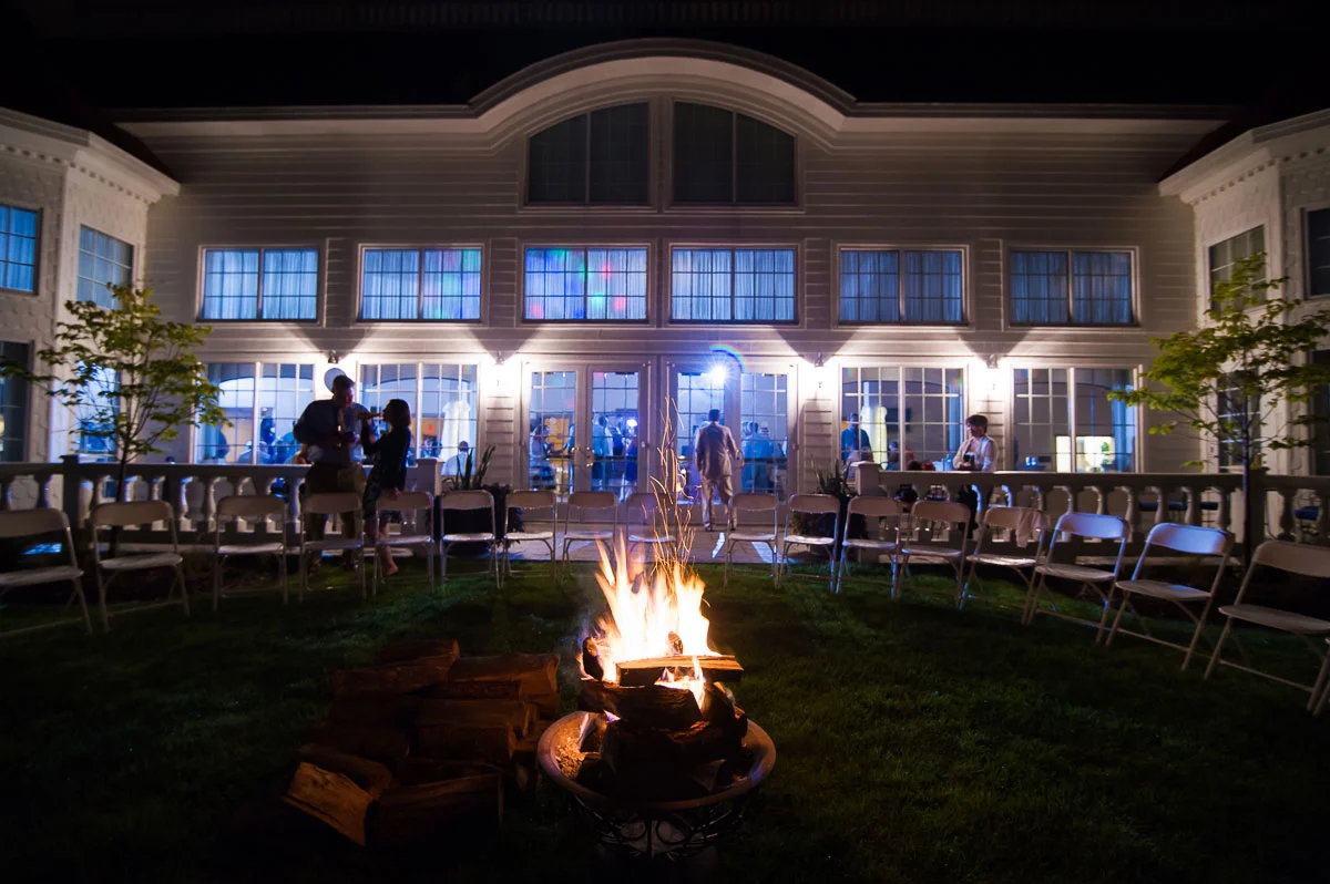 Bonfire outside a Blue Harbor Resort wedding reception.