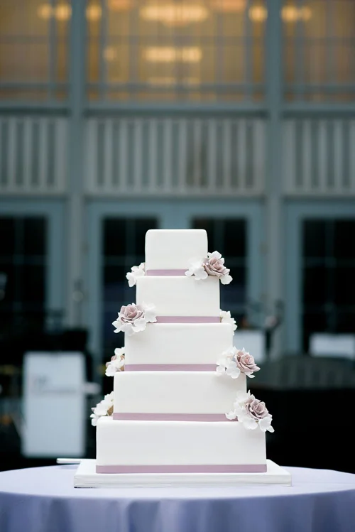 Detail photo of the wedding cake at the Winter Garden in the Harold Washington Library. 