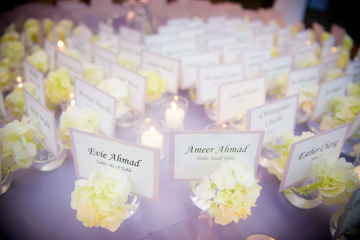Flowers and place cards at a Winter Garden wedding at the Harold Washington Library Chicago. 