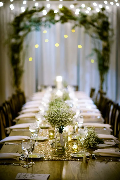 The head table designed by Art of Imagination during a wedding at the Bridgeport Arts Center. 