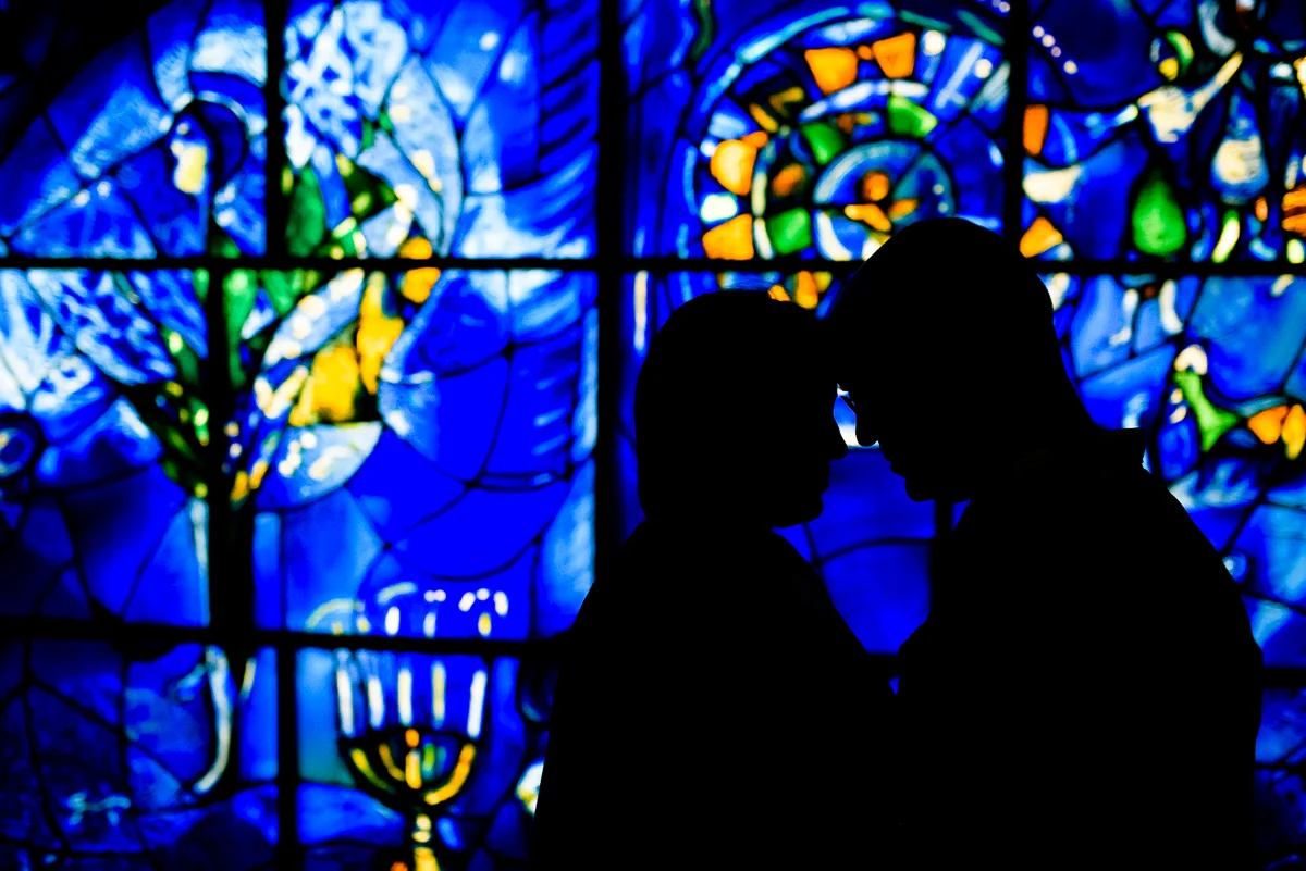 Bride & groom in front of the Chagall Windows at the Art Institute Chicago. 