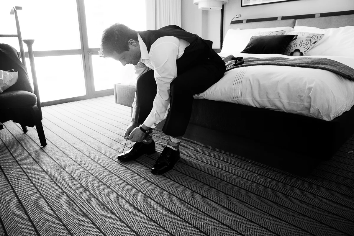 Groom getting ready before his wedding at the Thompson Chicago. 