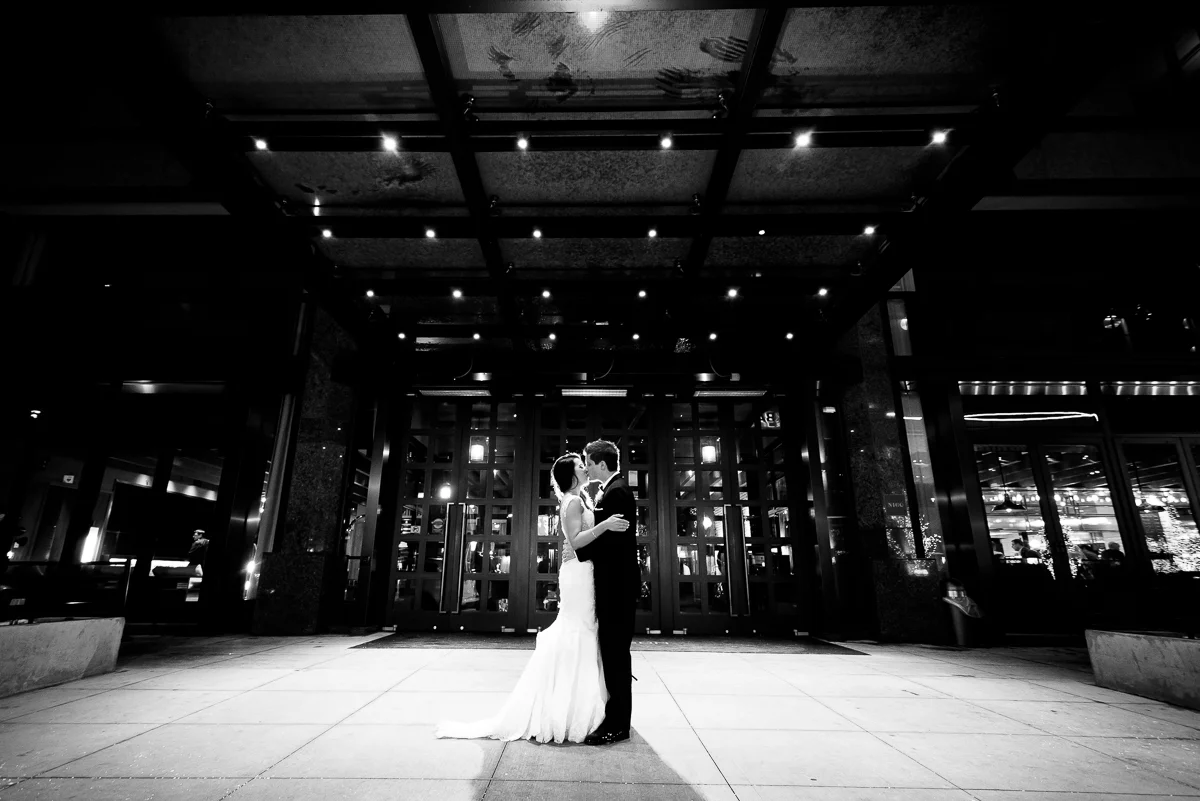 Night wedding portrait outside the Thompson Chicago. 