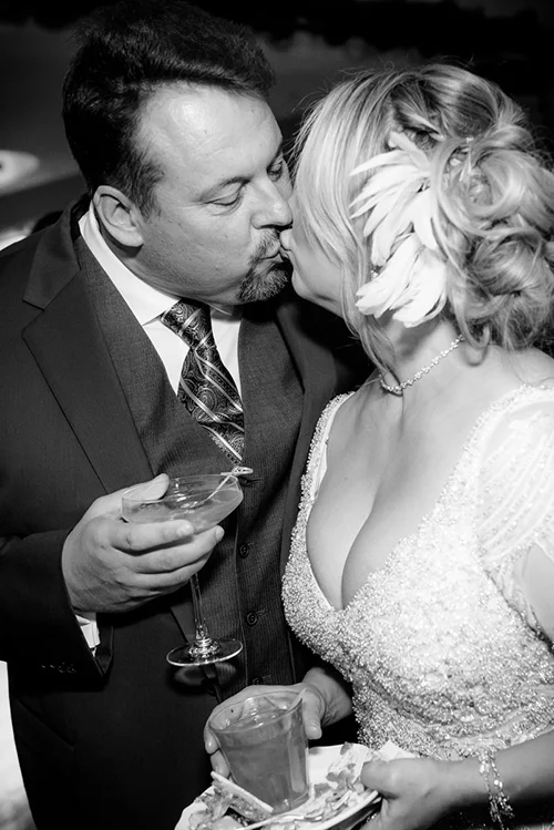 Couple shares a kiss during their New Year's Eve wedding at the Thompson Chicago. 