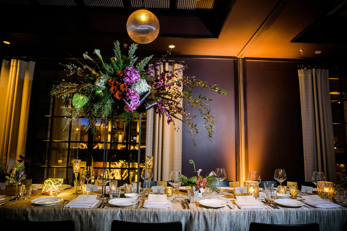 Centerpieces done by Stems Chicago at a New Year's Eve wedding at the Thompson Chicago. 