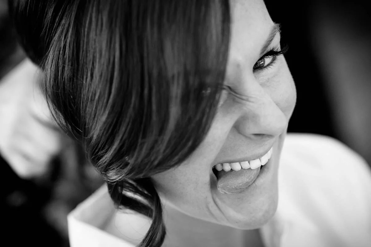 Bride getting ready, and goofing off, before her wedding at Moonlight Studios Chicago. 