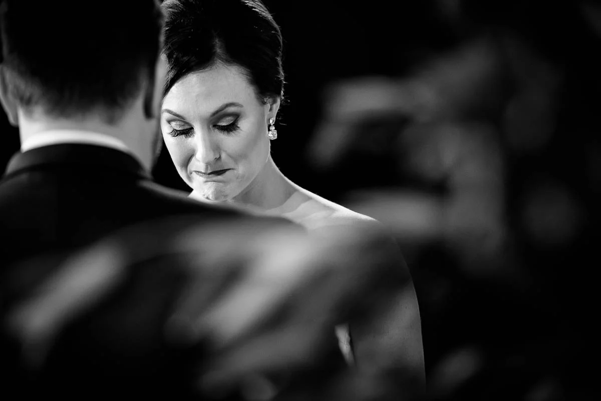 Emotional vows during a wedding ceremony at Moonlight Studios Chicago. 