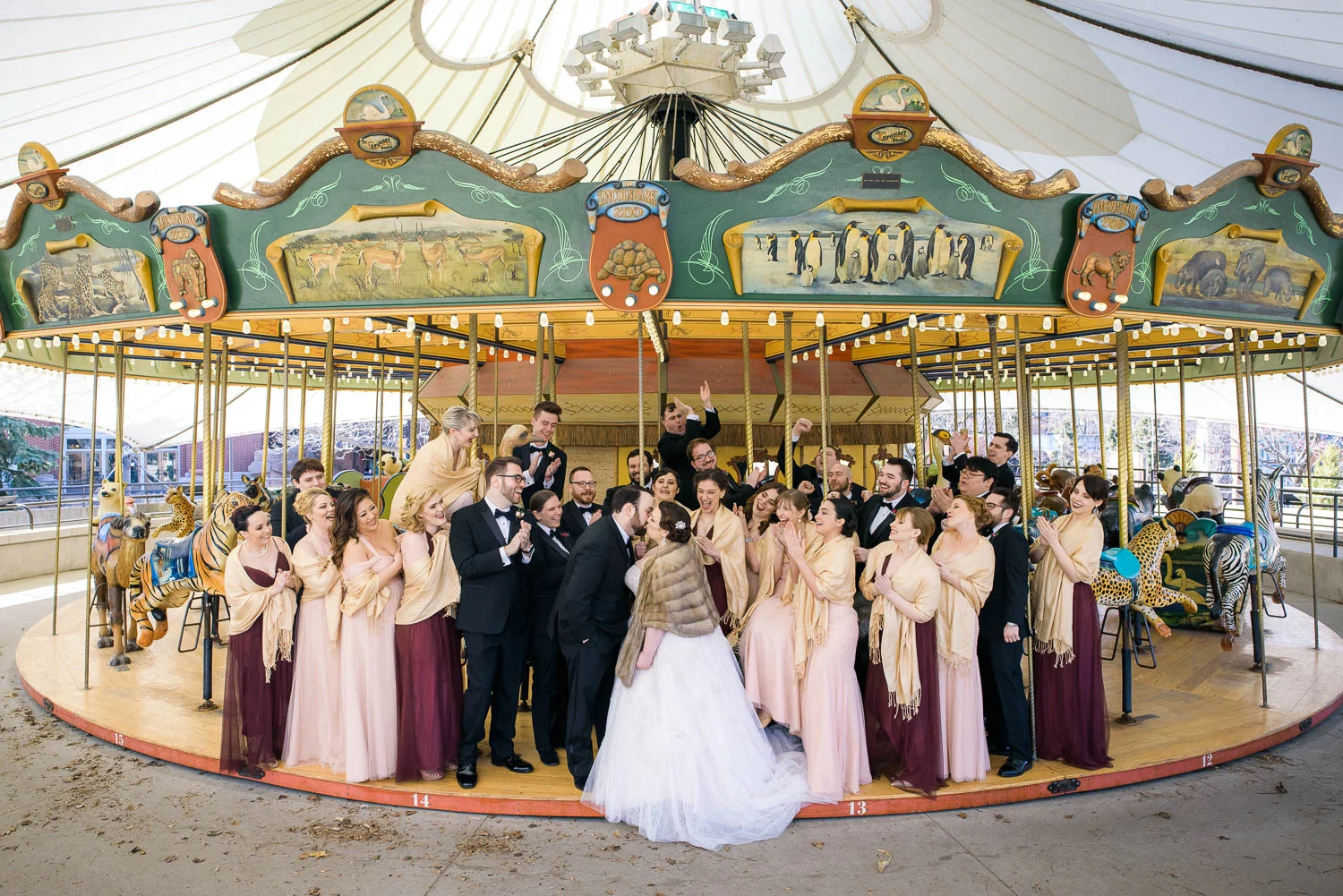 Bridal party portrait at the Lincoln Park Zoo Carousel before their Cafe Brauer wedding. 