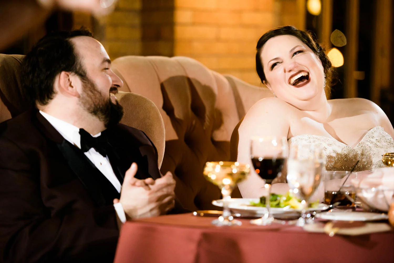 Fun moment of bride and groom during their wedding reception at Cafe Brauer Chicago. 