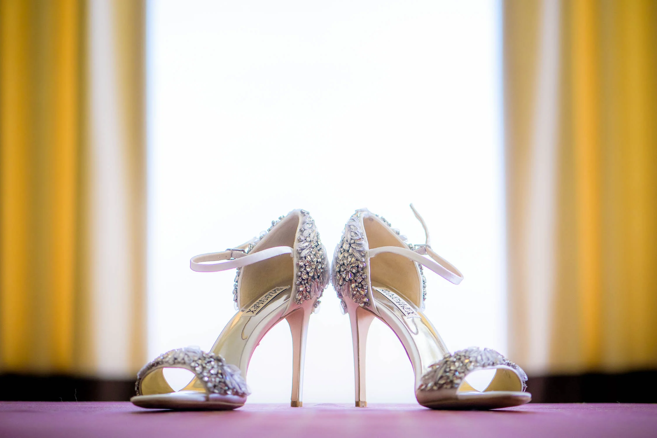 Detail photo of bride's shoes before her Bridgeport Art Center wedding in Chicago. 