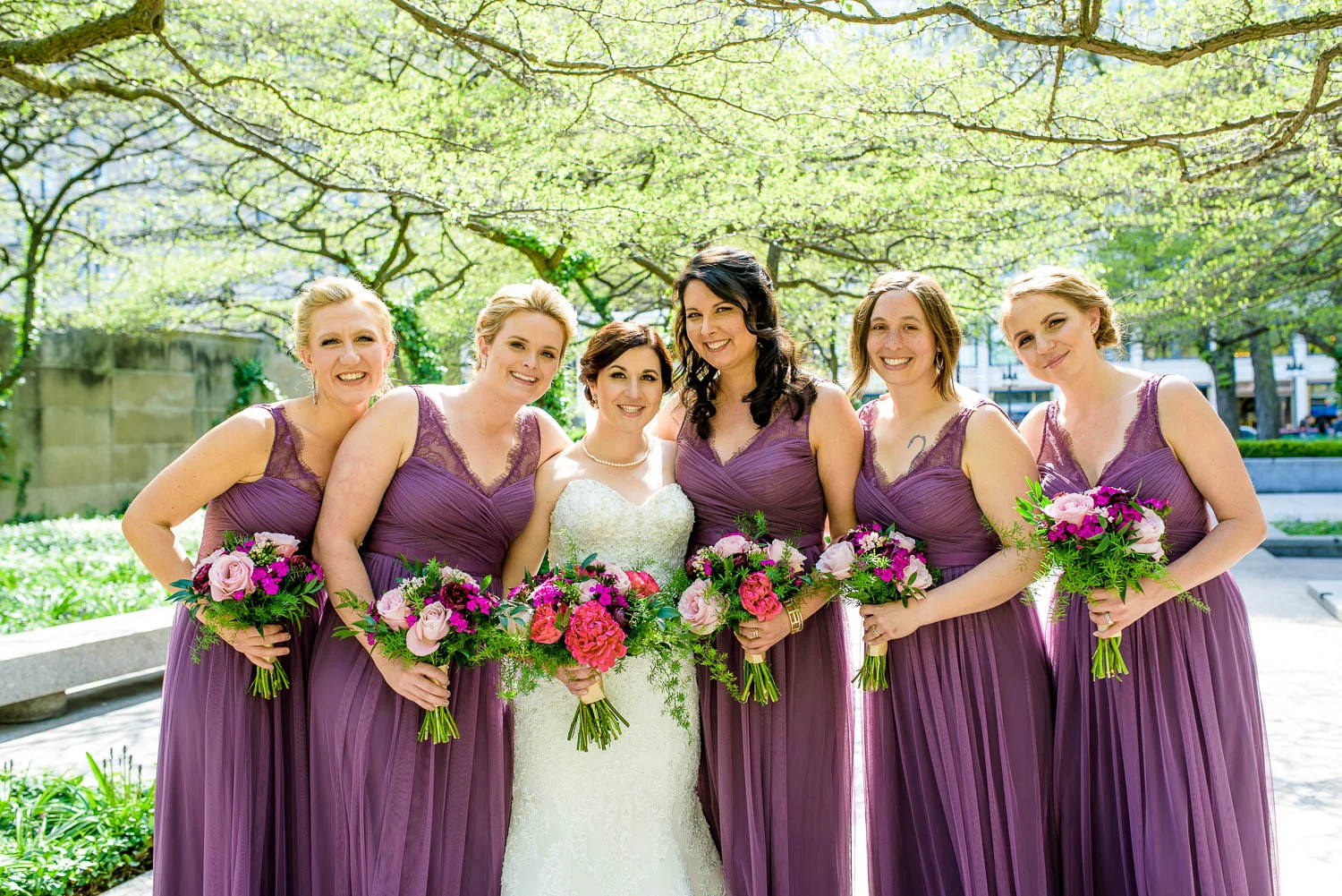 Bridesmaids during a Chicago wedding at the Art Institute South Gardens.