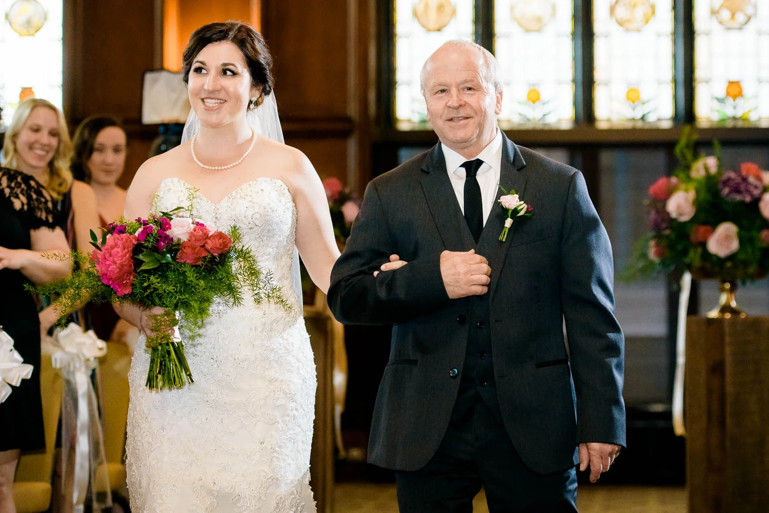 Father and bride walk down the aisle during a University Club of Chicago wedding. 