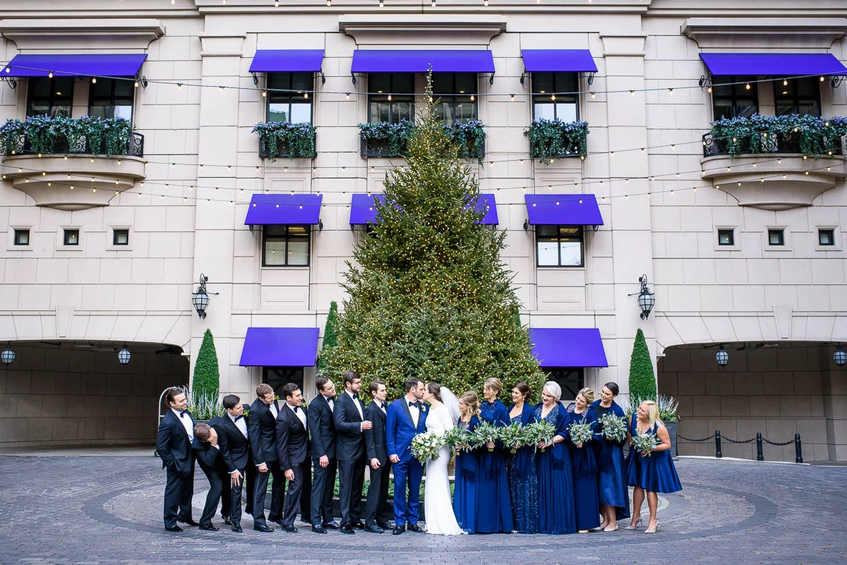 Wedding party portrait outside the Waldorf Astoria during a MCA Chicago winter wedding. 